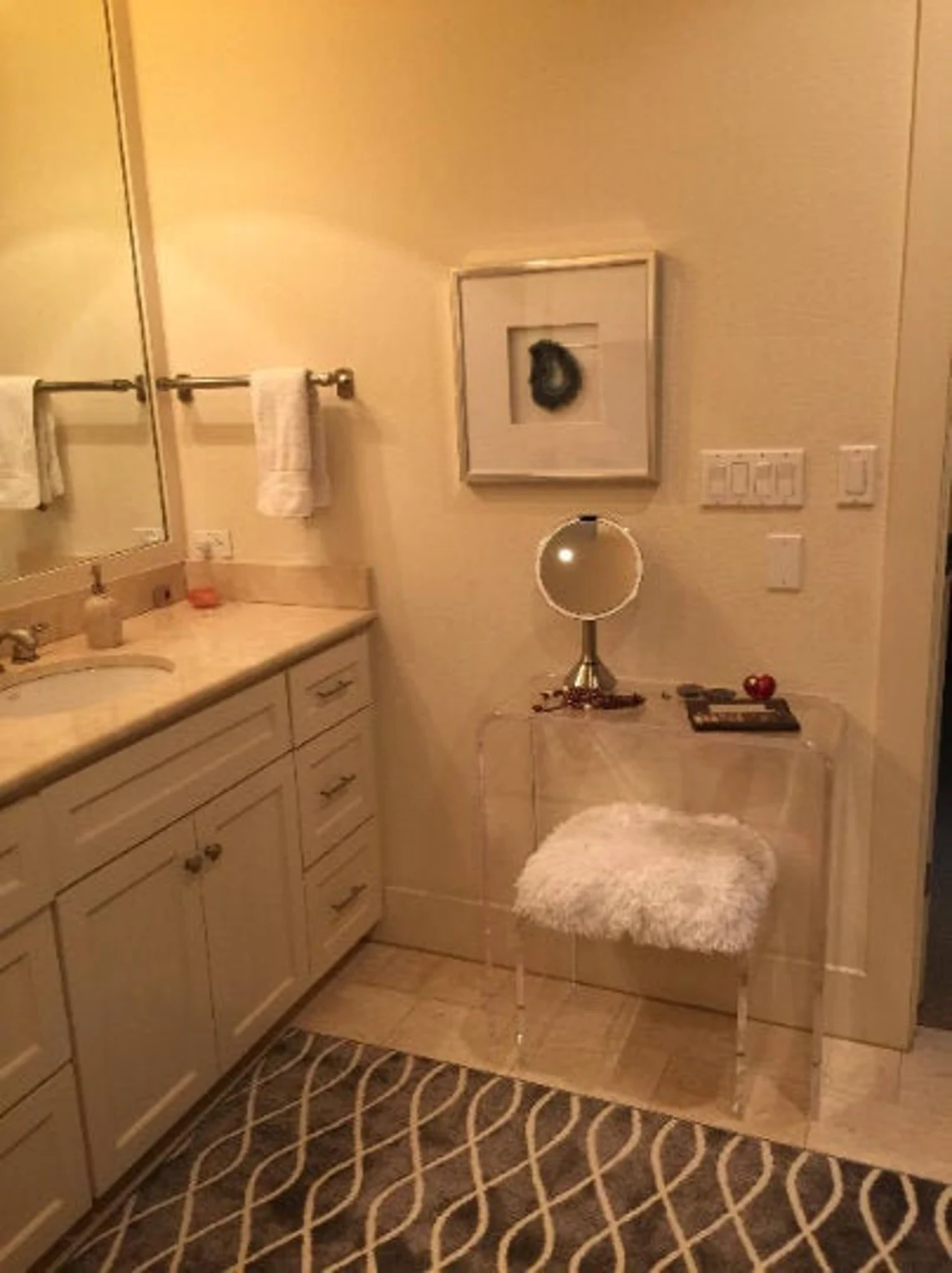 waterfall console table in bathroom
